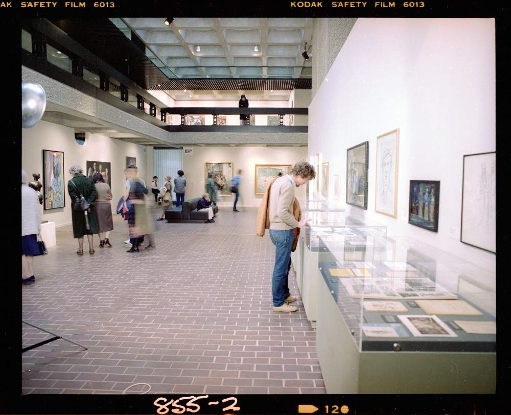 Visitors attend the inaugural exhibition in the Barbican Art GalleryPhoto: Peter Bloomfield