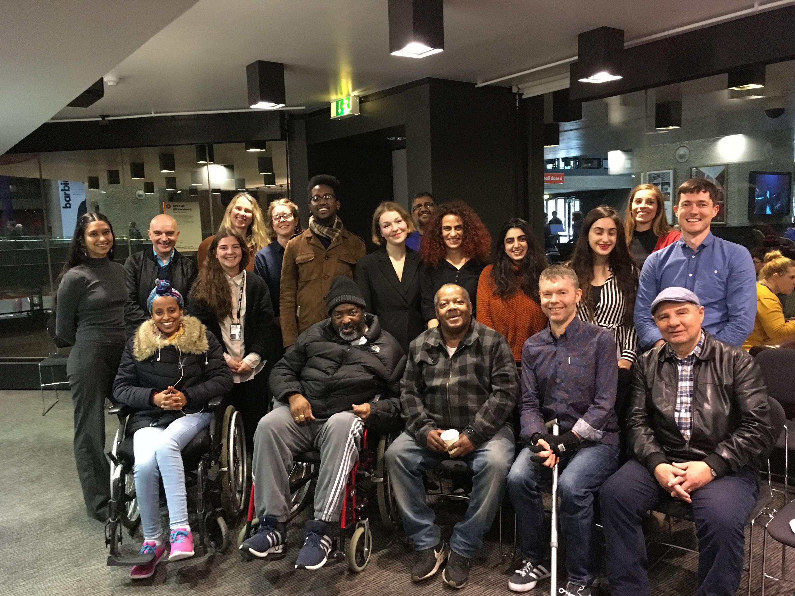 A large group of smiling people