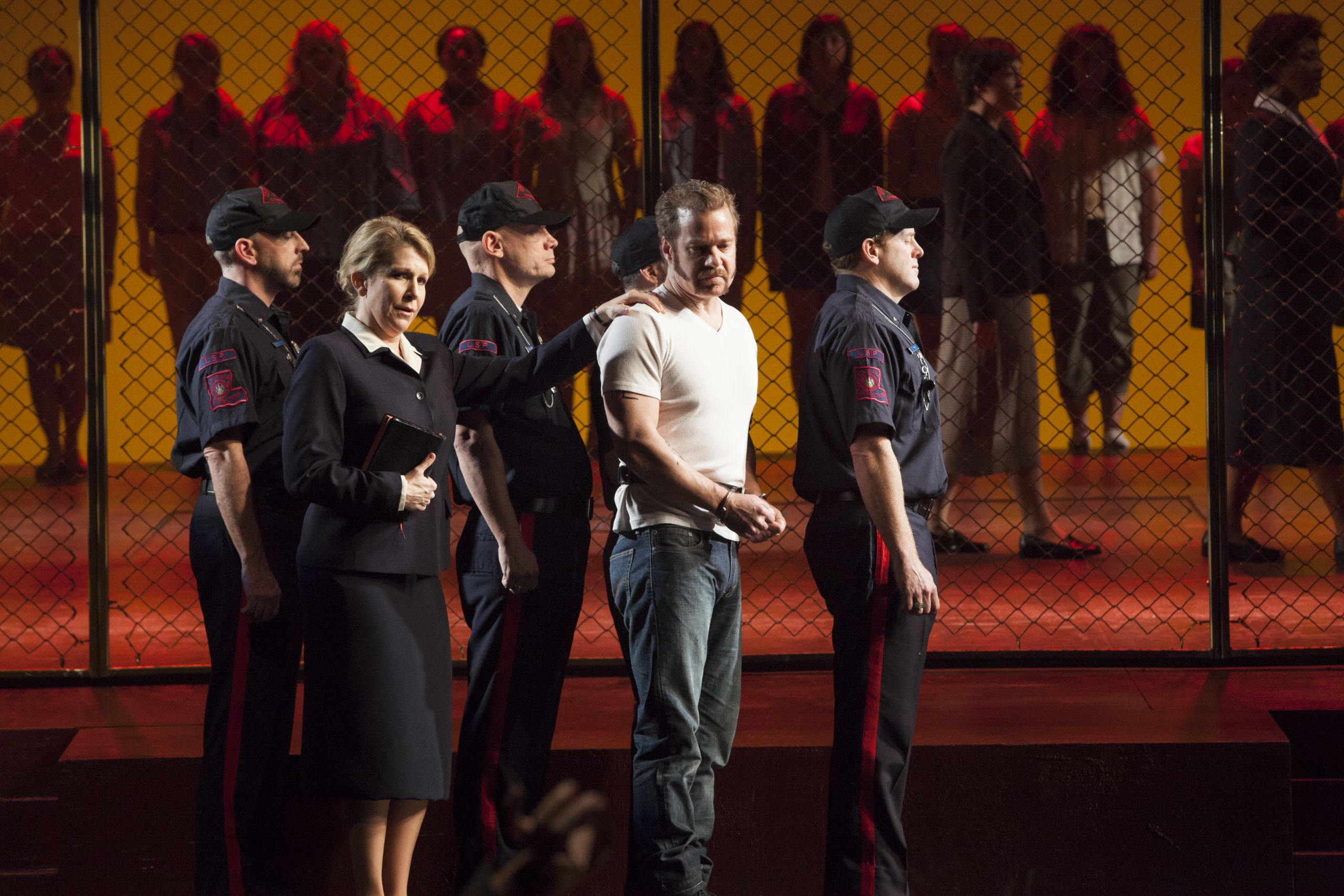 Woman holds mans shoulder surrounded by police