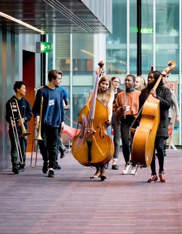 Players on their way to rehearsal at the Guildhall School